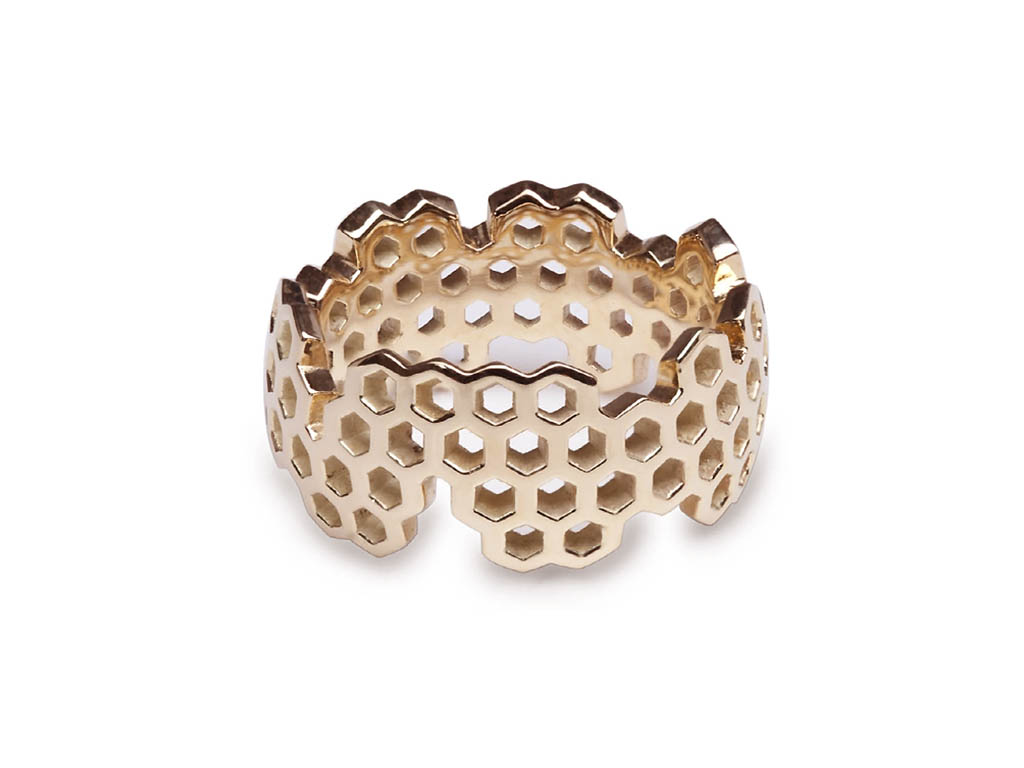 Geelgouden honingraad ring. gemaakt door Harm Becking